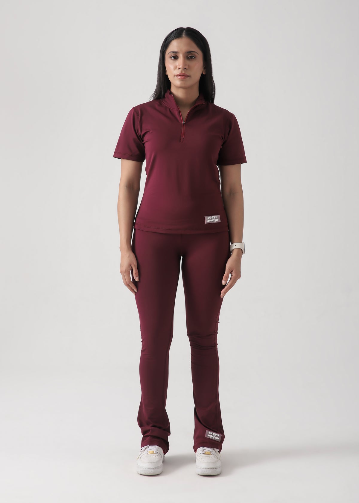 Flared leggings and fitted zip top set